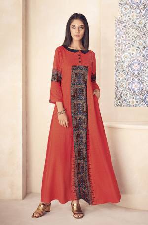 Grab This Very Pretty A-Line Patterned Designer Readymade Kurti In Orange Color Fabricated On Rayon. This Pretty Kurti IS Beautified With Prints All Over. It Is Light Weight And Durable. Buy now.
