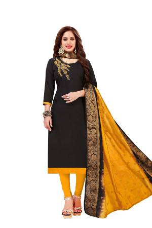 For A Bold And Bautiful Look, Grab This Dress Material In Black Colored Top Paired With Yellow Colored Bottom And Shaded Black And Yellow Dupatta. It Is Fabricated On Cotton Paired With Banarasi Art Silk Dupatta. 
