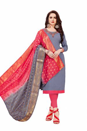 Flaunt Your Rich And Elegant Taste In This Designer Dress Material In Grey Colored Top Paired With Pink Colored Bottom And Pink And Grey Dupatta. Its Top And Bottom Are Cotton Based Paired With Banarasi Art Silk Dupatta. Buy This Now.