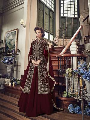 Enhance Your Personality Wearing This Heavy Designer Indo-Western Suit In Maroon Color Paired With Maroon Colored Bottom And Dupatta. Its Top IS Fabricated On Velvet Paired With Georgette Bottom And Chiffon Dupatta. Buy This Now.