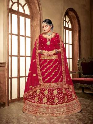 Here Is A Perfect Bridal Look For You With This Heavy designer Lehenga Choli In Red Color. This Lehenga Choli Is Velvet Based Paired With Net Fabricated Dupatta.Its Fabric Also Ensures Superb Comfort Throughout The Gala