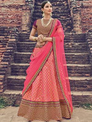 Wear This Pink Colored rich jacquard Silk Lehenga Ideal for party, festive & social gatherings. this gorgeous saree featuring a beautiful mix of designs. Its attractive color and jacquard lehenga with net fabrics work over the attire & contrast hemline adds to the look. Comes along with a contrast unstitched blouse.