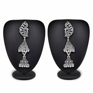 Buy This Pretty Pair Of Earrings In Silver Color Which Can Be Paired With Colored Attire. These Earrings Will Give A Pretty Elegant Look  Which Will eanr You Lots Of Compliments From Onlookers. 