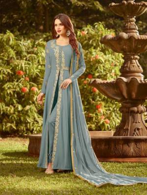 Celebrate This Festive Season With Rich Color And Fabric Wearing This Designer Floor Length Suit In Steel Blue Color. Its Top And Dupatta Are Fabricated On Georgette Paired With Santoon Bottom. Buy Now.