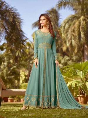 Celebrate This Festive Season With Rich Color And Fabric Wearing This Designer Floor Length Suit In Turquoise Blue Color. Its Top And Dupatta Are Fabricated On Georgette Paired With Santoon Bottom. Buy Now.