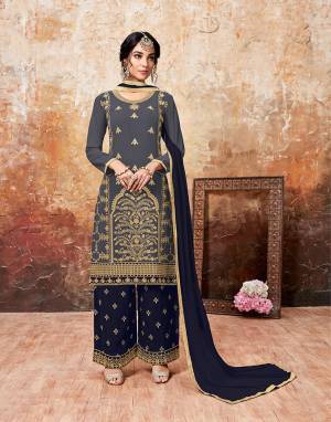 Grab This Beautiful Designer Plazzo Suit With Lovely Color Pallete. Iits top Is In Dark Grey Color Paired With Navy Blue Colored Bottom And Dupatta. Its Top And Bottom Are Georgette Based Paired With Chiffon Dupatta. Buy This Semi-Stitched Suit Now.