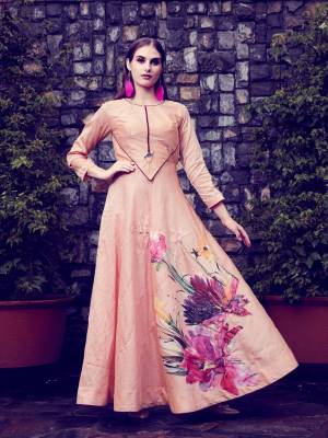 New Yoke Pattern Is Here With This Designer Readymade Long Kurti In Peach Color Fabricated On Art Silk. It Has Pretty Floral Patch Work And Available In All Regular Sizes. Buy Now.