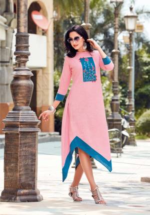 Look Pretty In This Readymade Kurti In Pink And Blue Color Fabricated On Linen Beautified With Thread Work. It Is Available In All Regular Sizes. Buy Now.