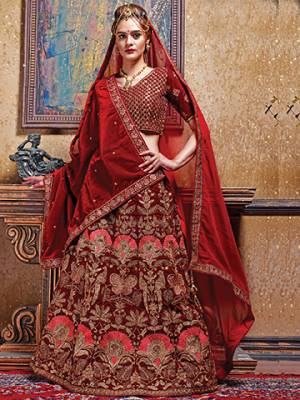 For A Royal And Elegant Look, Grab This Heavy Designer Lehenga Choli In Royal Maroon Color. This Lehenga Choli Is Fabricated On Velvet With Heavy Embroidery Paired With Georgette Fabricated Dupatta. Buy This Lehenga Choli Now.