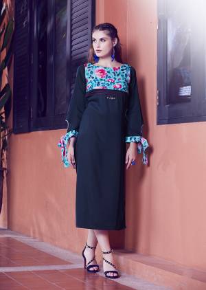 Enhance Your Personality Wearing This Readymade Kurti In Navy Blue Color Fabricated on Modal Silk Beautified With Prints. 