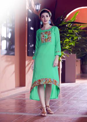 Pretty Elegant Looking Readymade Kurti Is Here In Light Green Color Fabricated On Modal Silk Beautified With Prints. 