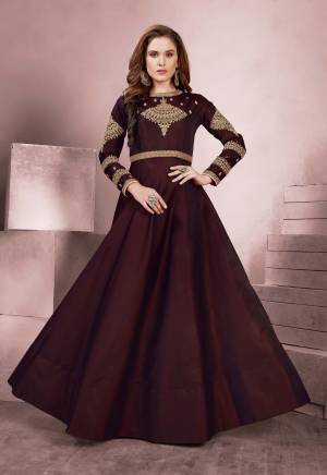 Royal Looking Designer Floor Length Gown Is Here In Maroon Color Based On Silk Fabric. This Readymade Gown Is Available In All Regular Sizes. 