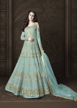 Look Pretty Wearing This Designer Floor Length Suit In Turquoise Blue Color Paired With Turquoise Blue Colored Bottom And Dupatta. Its Top and Dupatta Are Net Based Paired With Art Silk Bottom And Inner. Buy Now.