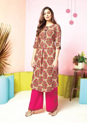 Grab This Pretty Designer Pair Of Kurti In Beige And Pink Colored Top Paired With Dark Pink colored Bottom. Its Top And Bottom Are Fabricated On Muslin Beautified With Prints And Thread Work. It Is Available In All Regular Sizes. 