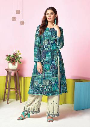 Add This Pretty Pair Of Kurti And Plazzo In Blue Colored Top Paired With White Colored Bottom. Its Top And Bottom Are Fabricated On Muslin Which Is Soft Towards Skin And Easy To Carry All Day Long. 
