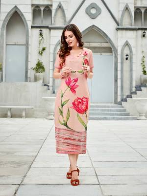 Look Pretty In This Beautiful Baby Pink Colored Readymade Kurti Fabricated On Linen. Its Fabric Is Light In Weight And Easy To Carry All Day Long. 