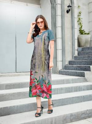 Pretty Shades Are Here With This Readymade Kurti In Blue And Grey Color Fabricated On Linen. It Has Pretty Floral Prints Over The Panel. Buy Now.