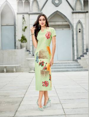 Pretty Shades Are Here With This Readymade Kurti In Light Green Color Fabricated On Linen. It Has Pretty Floral Prints Over The Panel. Buy Now.