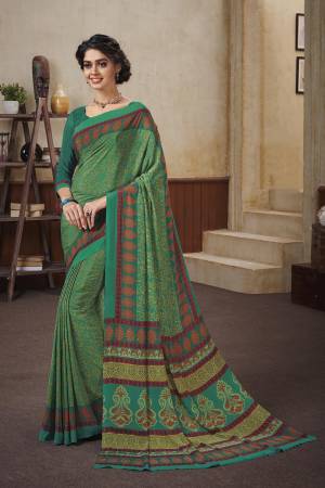 Add This Beautiful Saree To Your Wardrobe For Your Casuals Or Semi-Casual Wear. This Saree And Blouse Are Crepe Based Beautified With Prints. Grab It Now.