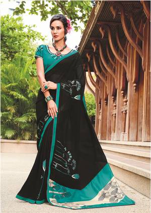 For A Bold And Beautiful Look, Grab This Saree In Black Color Paired With Teal Blue Colored Blouse. This Saree Is Fabricated On Georgette Paired With Art Silk Fabricated Blouse. Buy Now.