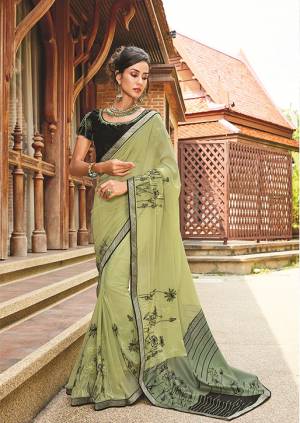 This Season Is Aboout Subtle Shades And Pastel Play, So Grab This Designer Saree In Mint Green Color Paired With Black Colored Blouse. This Saree IS Georgette Based Paired With Art Silk Blouse. Both Its Fabric Are Light Weight And Easy To Carry All Day Long. 