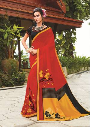 Adorn The Pretty Angelic Wearing This Designer Red Colored Saree Paired With Black Colored Blouse. This Saree Is Goergette Based Paired With Art Silk fabricated Blouse. It Is Light Weight And Easy To Carry All Day Long.
