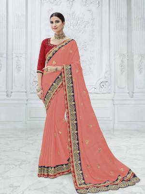Show your elegance by wearing this gorgeous Dark peach color chiffon pattern saree. Ideal for party, festive & social gatherings. this gorgeous saree featuring a beautiful mix of designs. Its attractive color and designer heavy embroidered design, Flower embroidered butta design, sequence design, beautiful floral design work over the attire & contrast hemline adds to the look. Comes along with a contrast unstitched blouse.