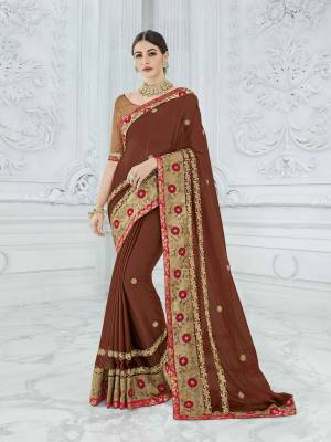 Attractively Gorgeous mesmerizing is what you will look at the next wedding gala wearing this beautiful Brown color two tone chiffon pattern saree. Ideal for party, festive & social gatherings. this gorgeous saree featuring a beautiful mix of designs. Its attractive color and designer heavy embroidered design, Flower embroidered butta design, resham and zari design, beautiful floral design work over the attire & contrast hemline adds to the look. Comes along with a contrast unstitched blouse.