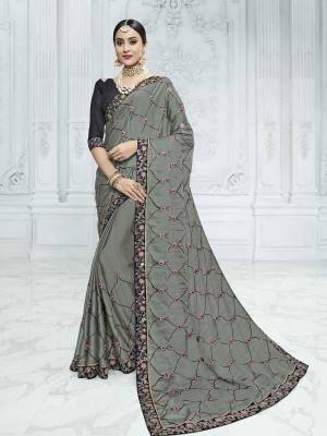 Get this amazing saree from Indian Women and look pretty like never before. wearing this grey color two tone chiffon pattern saree. Ideal for party, festive & social gatherings. this gorgeous saree featuring a beautiful mix of designs. Its attractive color and designer heavy embroidered design, Flower embroidered butta design, resham and zari design, beautiful floral design work over the attire & contrast hemline adds to the look. Comes along with a contrast unstitched blouse.