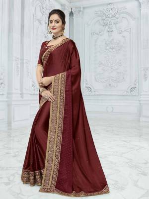 Flaunt your gorgeous look wearing this maroon color two tone chiffon pattern saree. Ideal for party, festive & social gatherings. this gorgeous saree featuring a beautiful mix of designs. Its attractive color and designer heavy embroidered design, Flower embroidered and stone design, sequence design, beautiful floral design work over the attire & contrast hemline adds to the look. Comes along with a contrast unstitched blouse.