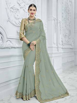 Wear this Pastel green and gold color georgette saree. Ideal for party, festive & social gatherings. this gorgeous saree featuring a beautiful mix of designs. Its attractive color and designer heavy embroidered design, Flower embroidered patch design, sequence design, beautiful floral design work over the attire & contrast hemline adds to the look. Comes along with a contrast unstitched blouse.