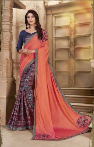 Shine Bright In This Designer Orange And Navy Blue Colored Saree Paired With Navy Blue Colored Blouse. This Saree And Blouse Are Fabricated On Art Silk Beautified With Prints And Patch Work. This Silk Based Saree Gives A Rich Look To Your Personality. 
