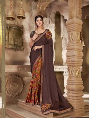 Enhance Your Personality Wearing This Rich Silk Based Saree In Brown And Multi Color Paired With Brown Colored Blouse, This Saree And Blouse Are Fabricated On Art Silk Beautified With Prints And Patch Work. 