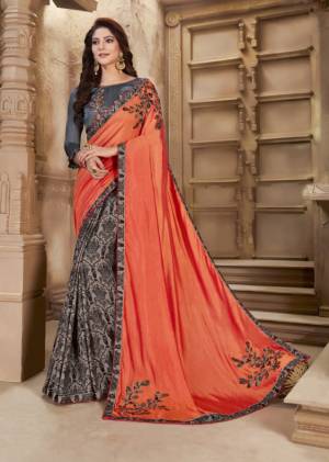 Shine Bright In This Designer Orange And Grey Colored Saree Paired With Dark Grey Colored Blouse. This Saree And Blouse Are Fabricated On Art Silk Beautified With Prints And Patch Work. This Silk Based Saree Gives A Rich Look To Your Personality. 