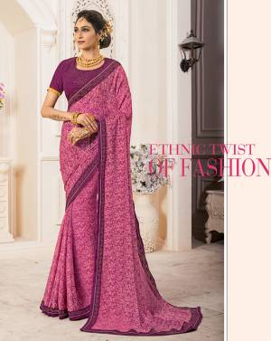 Look Pretty In This Pink Colored Saree Paired With Purple Colored Blouse. This Saree Is Fabricated On Georgette Chiffon Paired With Art Silk Fabricated Blouse. It Is Beautified With Prints And Stone Work. 