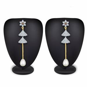 Give More Pretty Look To Your Attire By Pairing It Up With This Lovely Pair Of Earring Which Can Suit Wilth Any Colored Traditional Attire. Also It Is Light In Weight And Easy To Carry All Day Long. 