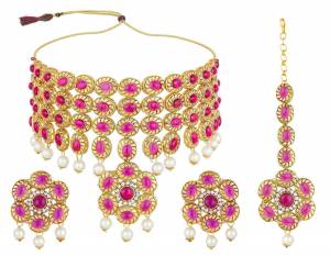 Grab This Pretty Choker Patterned Necklace Set In Golden Color Which Comes With A Pair Of Earrings And A Maang Tika. This Pretty Set Can Be Paired With Any Type Of Ethnic Attire.