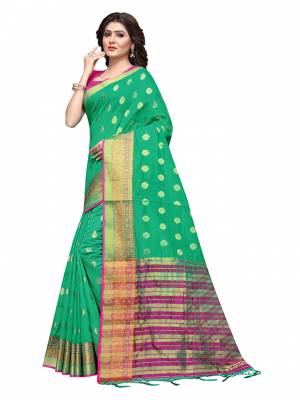 This Festive Season, Feel Comfortable And Look Beautiful Wearing This Lovely Cotton Silk Based Saree Beautified With Weave All. This Saree Is Light In Weight And easy To Carry All Day Long. Buy Now.