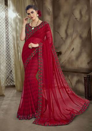 Adorn The Pretty angelic Look In This Red Colored Saree Paired With Brown Colored Blouse. This Saree Is Fabricated On Georgette Paired With Art Silk Fabricated Blouse. 