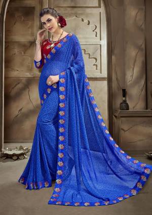 Bright And Visually Appealing Color Is Here With This Designer Saree In Royal Blue Color Paired With Contrasting Maroon Colored Blouse. This Georgette Based Saree Is Light Weight And Easy To Carry All Day Long. 