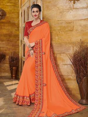 Change your wardrobe and get classier outfits like this gorgeous Orange color silk fabrics saree. Ideal for party, festive & social gatherings. this gorgeous saree featuring a beautiful mix of designs. Its attractive color and heavy designer embroidered saree, patch design, full saree design saree, beautiful floral design all over work over the attire & contrast hemline adds to the look. Comes along with a contrast unstitched blouse.