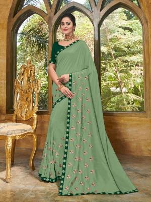 Show your elegance by wearing this gorgeous Mint green color bright georgette saree. Ideal for party, festive & social gatherings. this gorgeous saree featuring a beautiful mix of designs. Its attractive color and heavy designer embroidered saree, full saree design saree, beautiful floral design all over work over the attire & contrast hemline adds to the look. Comes along with a contrast unstitched blouse.