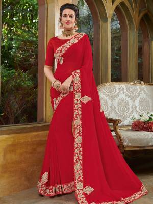 Gorgeously mesmerizing is what you will look at the next wedding gala wearing this beautiful red color georgette saree. Ideal for party, festive & social gatherings. this gorgeous saree featuring a beautiful mix of designs. Its attractive color and heavy designer embroidered saree, full saree design saree, beautiful floral design all over work over the attire & contrast hemline adds to the look. Comes along with a contrast unstitched blouse.