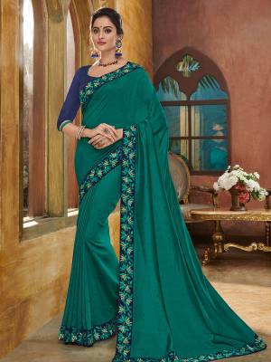 You Look elegant and stylish this festive season by draping this Teal green color silk fabrics saree. Ideal for party, festive & social gatherings. this gorgeous saree featuring a beautiful mix of designs. Its attractive color and heavy designer embroidered saree, full saree design saree, beautiful floral design all over work over the attire & contrast hemline adds to the look. Comes along with a contrast unstitched blouse.