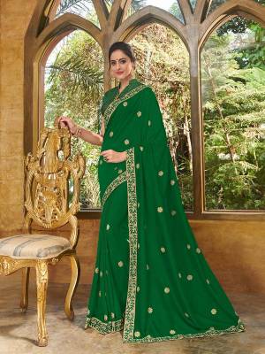 Vibrant and visually appealing, this green color silk fabrics saree. Ideal for party, festive & social gatherings. this gorgeous saree featuring a beautiful mix of designs. Its attractive color and heavy designer embroidered saree, full saree design saree, beautiful floral design all over work over the attire & contrast hemline adds to the look. Comes along with a contrast unstitched blouse.
