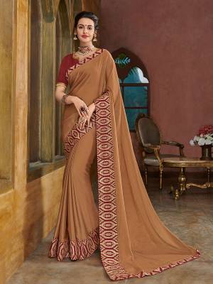 The fabulous pattern makes this saree a classy number to be included in your wardrobe. Beige color two tone bright chiffon saree. Ideal for party, festive & social gatherings. this gorgeous saree featuring a beautiful mix of designs. Its attractive color and heavy designer embroidered saree, full saree design saree, sequence designs, beautiful floral design all over work over the attire & contrast hemline adds to the look. Comes along with a contrast unstitched blouse.