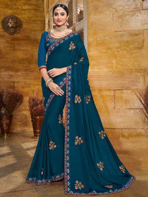 You Look elegant and stylish this festive season by draping this Blue color two tone bright georgette saree. Ideal for party, festive & social gatherings. this gorgeous saree featuring a beautiful mix of designs. Its attractive color and heavy designer embroidered saree, full saree design saree, sequence designs, beautiful floral design all over work over the attire & contrast hemline adds to the look. Comes along with a contrast unstitched blouse.