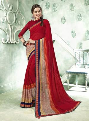 Simple Saree Is Here For Your Casual Wear In Red Color Paired With Red Colored Blouse. This Saree And Blouse Are Fabricated On Georgette Beautified With Prints And lace Border. 