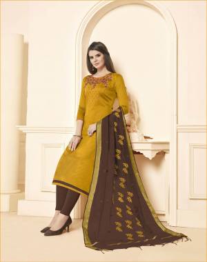 Unqiue Color Pallete Is Here With This Dress Material In Musturd Yellow Colored Top Paired With Contrasting Brown Colored Bottom And Dupatta. Its Top and Bottom Are Cotton Based Paired With Chanderi Dupatta. 