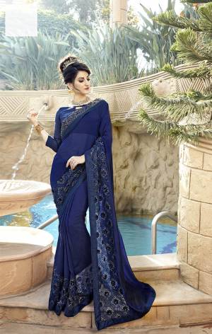 Enhance Your Personality Wearing This Designer Saree In Navy Blue Color Paired With Navy Blue Colored Blouse. This Saree Is Georgette Based Paired With Art Silk Fabricated Blouse. Buy This Saree Now.
